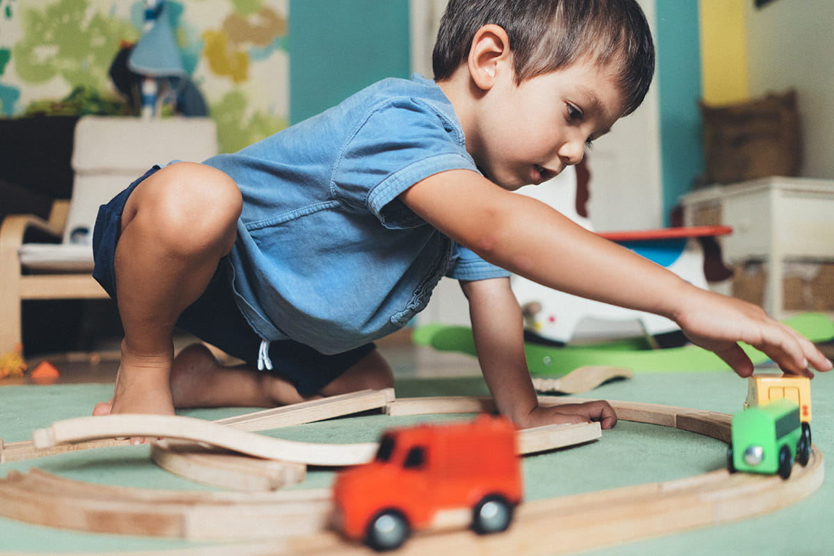 boy-with-cars-playing